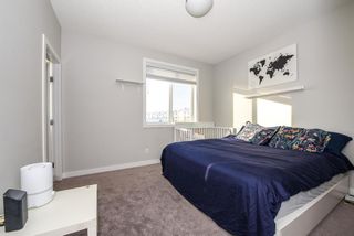 Photo 18: 404 Redstone Crescent NE in Calgary: Redstone Row/Townhouse for sale : MLS®# A1178308