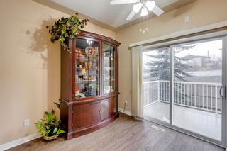Photo 14: 128 Country Hills Gardens NW in Calgary: Country Hills Row/Townhouse for sale : MLS®# A1157775