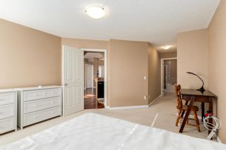 Photo 18: 205 Springbank Terrace SW in Calgary: Springbank Hill Semi Detached for sale : MLS®# A1182683