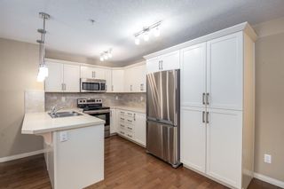 Photo 4: 2207 130 Panatella Street NW in Calgary: Panorama Hills Apartment for sale : MLS®# A2000512