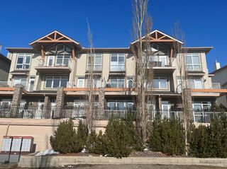 Photo 1: 5 132 Rockyledge View NW in Calgary: Rocky Ridge Row/Townhouse for sale : MLS®# A2027628