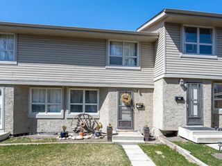Photo 2: 55 123 Queensland Drive SE in Calgary: Queensland Row/Townhouse for sale : MLS®# A1101736