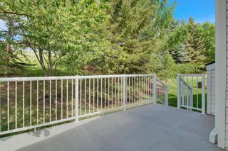 Photo 32: 107 Rocky Ridge Villas NW in Calgary: Rocky Ridge Semi Detached (Half Duplex) for sale : MLS®# A2052161