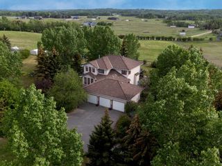 Photo 1: 262201 Poplar Hill Drive NW in Rural Rocky View County: Rural Rocky View MD Detached for sale : MLS®# A2022460