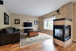 Photo 12: 7866 Springbank Way SW in Calgary: Springbank Hill Detached for sale : MLS®# A1232036