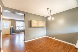 Photo 8: 321 Queenston Heights SE in Calgary: Queensland Row/Townhouse for sale : MLS®# A1201430