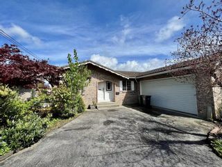 Photo 1: 2311 HURON Drive in Coquitlam: Chineside House for sale : MLS®# R2685061