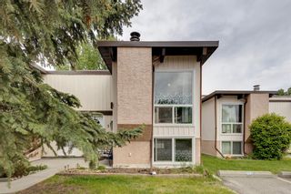 Photo 2: 156 Oaktree Lane SW in Calgary: Oakridge Semi Detached (Half Duplex) for sale : MLS®# A2051256