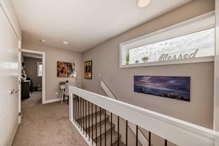 Photo 17: 99 Wolf Creek Avenue SE in Calgary: C-281 Row/Townhouse for sale : MLS®# A2130756
