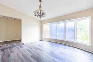 Photo 2: 331 Edgehill Drive NW in Calgary: Edgemont Detached for sale : MLS®# A1140206