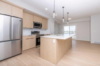 Photo 4: 2206 19489 Main Street SE in Calgary: Seton Apartment for sale : MLS®# A2114901