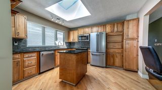 Photo 12: 716 Willacy Drive SE in Calgary: Willow Park Detached for sale : MLS®# A2052774