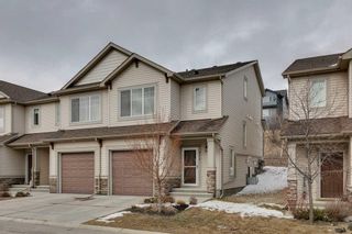 Photo 1: 217 Sunset Point: Cochrane Row/Townhouse for sale : MLS®# A2120759