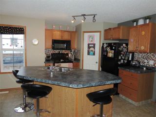 Photo 5: 1056 EVERRIDGE Drive SW in Calgary: Evergreen House for sale : MLS®# C4005156