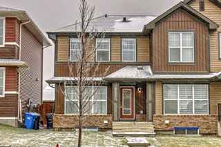 Photo 1: 867 Carrington Boulevard NW in Calgary: Carrington Semi Detached (Half Duplex) for sale : MLS®# A2089585