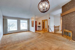 Photo 6: 256 Ranchridge Court NW in Calgary: Ranchlands Detached for sale : MLS®# A1232818