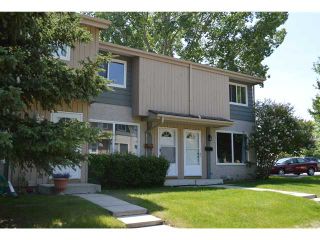 Photo 1: 202 999 CANYON MEADOWS Drive SW in CALGARY: Canyon Meadows Townhouse for sale (Calgary)  : MLS®# C3620666