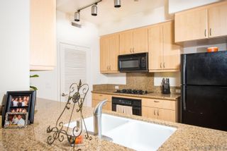 Photo 11: MISSION VALLEY Condo for sale : 2 bedrooms : 8211 station village lane #1103 in San Diego