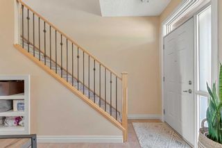 Photo 3: 8 148 Rockyledge View NW in Calgary: Rocky Ridge Row/Townhouse for sale : MLS®# A2069963
