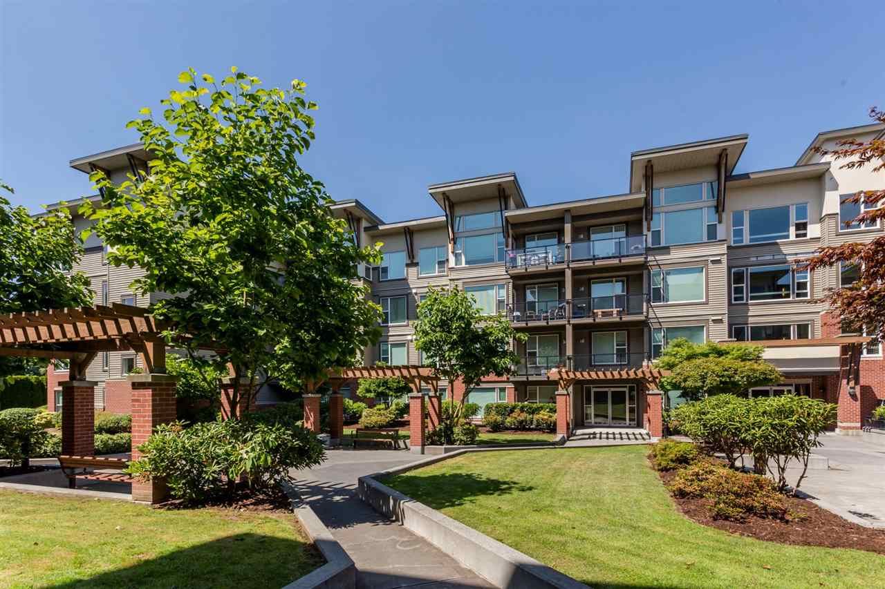 Main Photo: 409 33538 MARSHALL Road in Abbotsford: Central Abbotsford Condo for sale in "THE CROSSING" : MLS®# R2326134