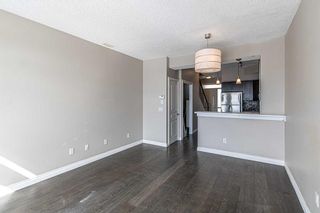 Photo 8: 12 133 Rockyledge View NW in Calgary: Rocky Ridge Row/Townhouse for sale : MLS®# A2120270