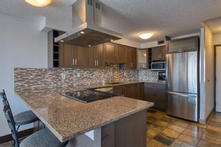Photo 4: 601 1900 25A Street SW in Calgary: Richmond Apartment for sale : MLS®# A2049553