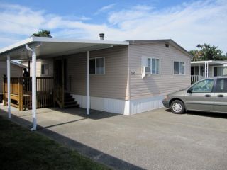 Photo 2: 263 201 CAYER Street in Coquitlam: Maillardville Manufactured Home for sale in "WILDWOOD PARK" : MLS®# V1037908