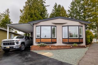 Photo 1: 154 3665 244 Street in Langley: Otter District Manufactured Home for sale in "LANGLEY GROVE ESTATES" : MLS®# R2852199