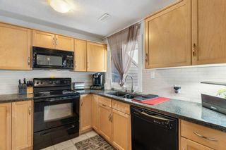 Photo 10: 219 36 Glamis Green SW in Calgary: Glamorgan Row/Townhouse for sale : MLS®# A2057613