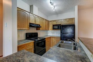 Photo 7: 103 72 Quigley Drive: Cochrane Apartment for sale : MLS®# A1149156