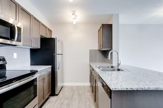 Photo 5: 313 10 Kincora Glen Park NW in Calgary: Kincora Apartment for sale : MLS®# A1234272