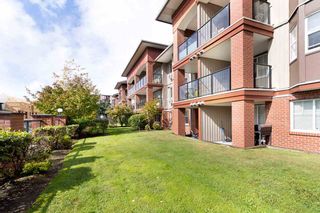 Photo 1: 211 19774 56 Avenue in Langley: Langley City Condo for sale in "MADISON STATION" : MLS®# R2537898