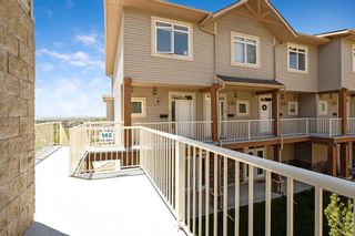 Photo 4: 9 145 Rockyledge View NW in Calgary: Rocky Ridge Row/Townhouse for sale : MLS®# A2138907