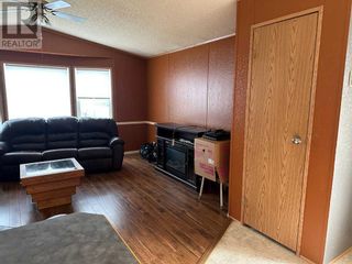 Photo 5: 66, 404 6 Avenue NW in Slave Lake: House for sale : MLS®# A2086005