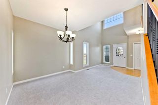 Photo 8: 59 St Moritz Terrace SW in Calgary: Springbank Hill Detached for sale : MLS®# A2080924