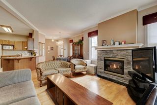 Photo 9: 801 39 Hidden Creek Place NW in Calgary: Hidden Valley Row/Townhouse for sale : MLS®# A2050933