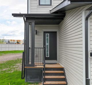 Photo 2: 644 Southpoint Heath SW: Airdrie Semi Detached (Half Duplex) for sale : MLS®# A2133034
