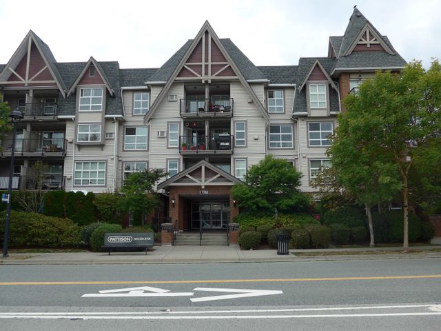 Main Photo: 410 17769 57 AVE Avenue in Surrey: Cloverdale BC Condo for sale in "clover downs estates" (Cloverdale)  : MLS®# R2812315