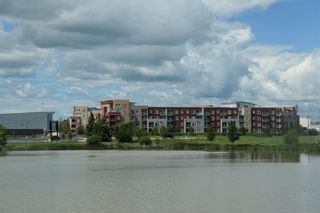 Photo 2: 2432 604 East Lake Boulevard NE: Airdrie Apartment for sale : MLS®# A1219151