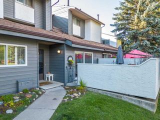Photo 1: 407 2520 Palliser Drive SW in Calgary: Oakridge Row/Townhouse for sale : MLS®# A2079777