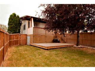 Photo 18: 229 QUEENSLAND Drive SE in Calgary: Queensland House for sale : MLS®# C4022795