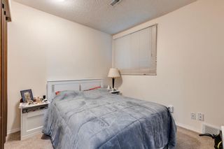 Photo 13: 150 Oaktree Lane SW in Calgary: Oakridge Semi Detached (Half Duplex) for sale : MLS®# A2058320