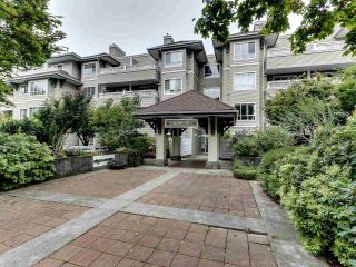 Photo 1: 411 6745 STATION HILL Court in Burnaby: South Slope Condo for sale in "THE SALTSPRING" (Burnaby South)  : MLS®# R2499517