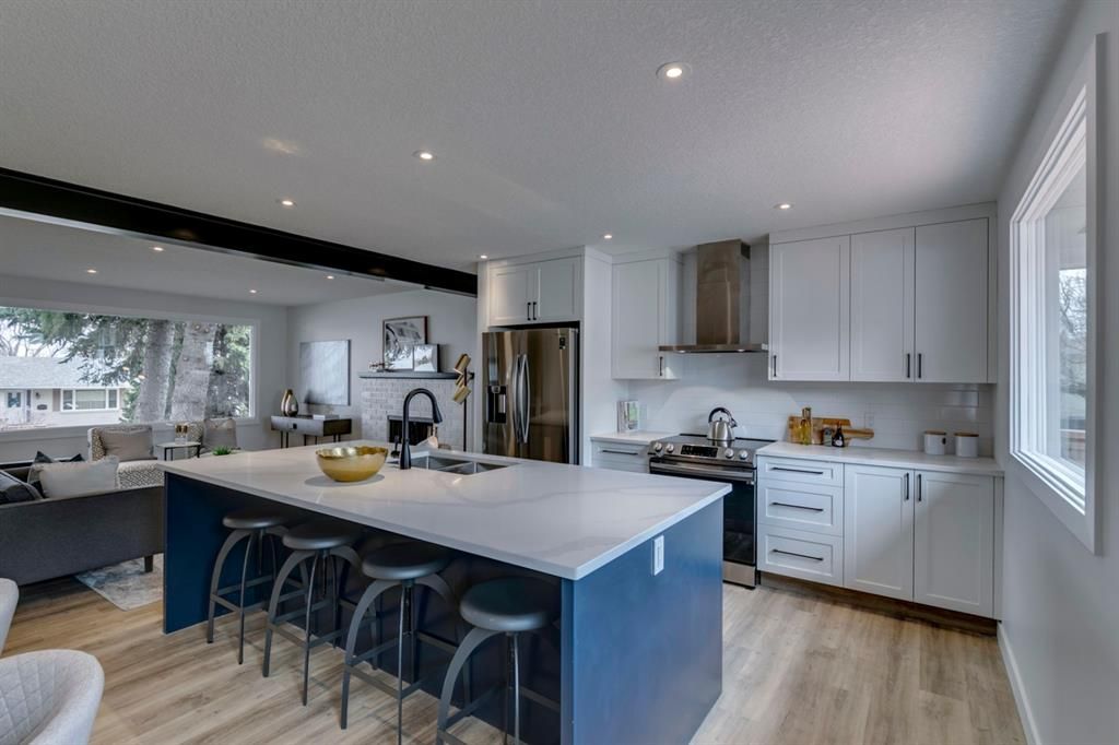 Main Photo: 7139 Hunterwood Road NW in Calgary: Huntington Hills Detached for sale : MLS®# A1213974