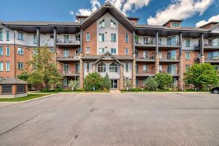 Photo 2: 2306 15 Sunset Square: Cochrane Apartment for sale : MLS®# A2144312