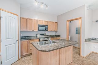 Photo 15: 104 151 Panatella Landing NW in Calgary: Panorama Hills Row/Townhouse for sale : MLS®# A2020288