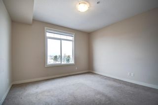 Photo 25: 304 132 1 Avenue NW: Airdrie Apartment for sale : MLS®# A1130474