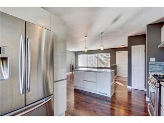 Photo 5: 5612 LADBROOKE Drive SW in Calgary: Lakeview House for sale : MLS®# C4036600