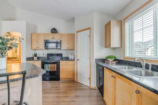 Photo 13: 201 70 Panatella Landing NW in Calgary: Panorama Hills Row/Townhouse for sale : MLS®# A2074229