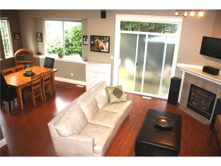 Photo 2: 18 1506 EAGLE MOUNTAIN Drive in Coquitlam: Westwood Plateau Townhouse for sale in "RIVER ROCK" : MLS®# V903306